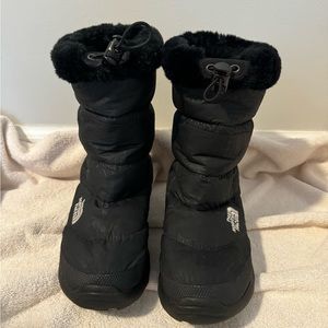 The North Face Women’s Nuptse winter boots.